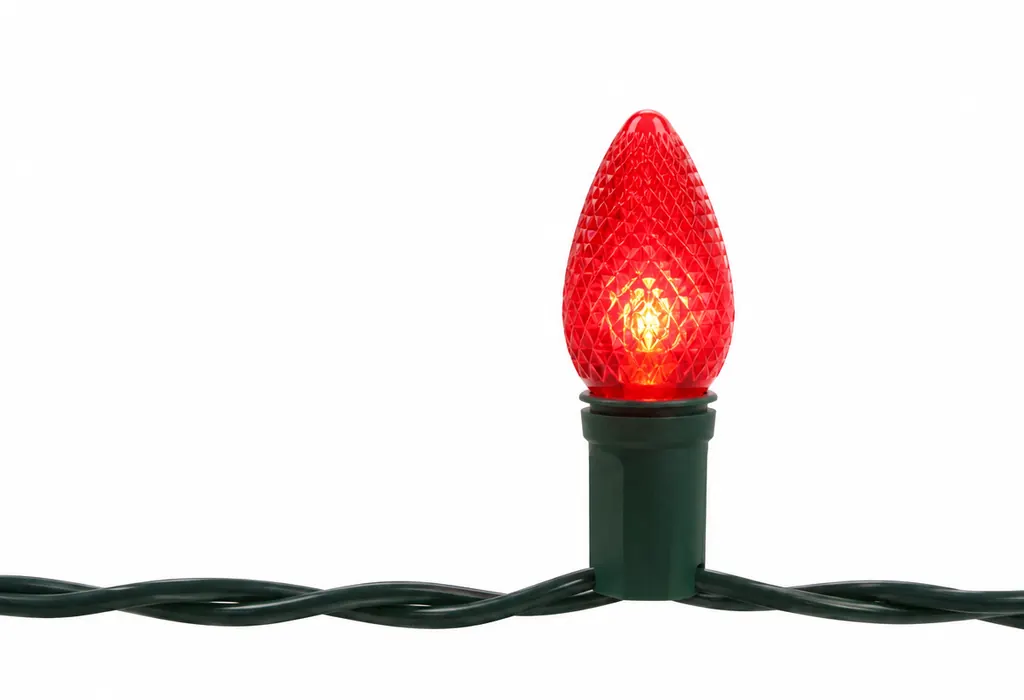 Red faceted Christmas roofline bulb on green wire